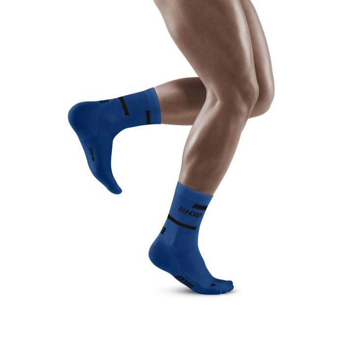 Laden Sie das Bild in Galerie -Viewer, {The Run Compressions Socks Mid Cut Men
